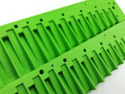 sanded comb and unsanded comb (green)